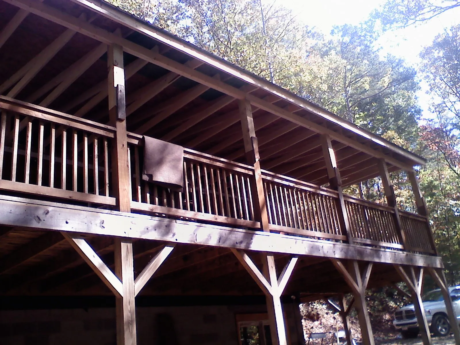 Timber framing under a new elevated porch and deck — Roof Leak Repair in Harpswell by Roofing Brothers